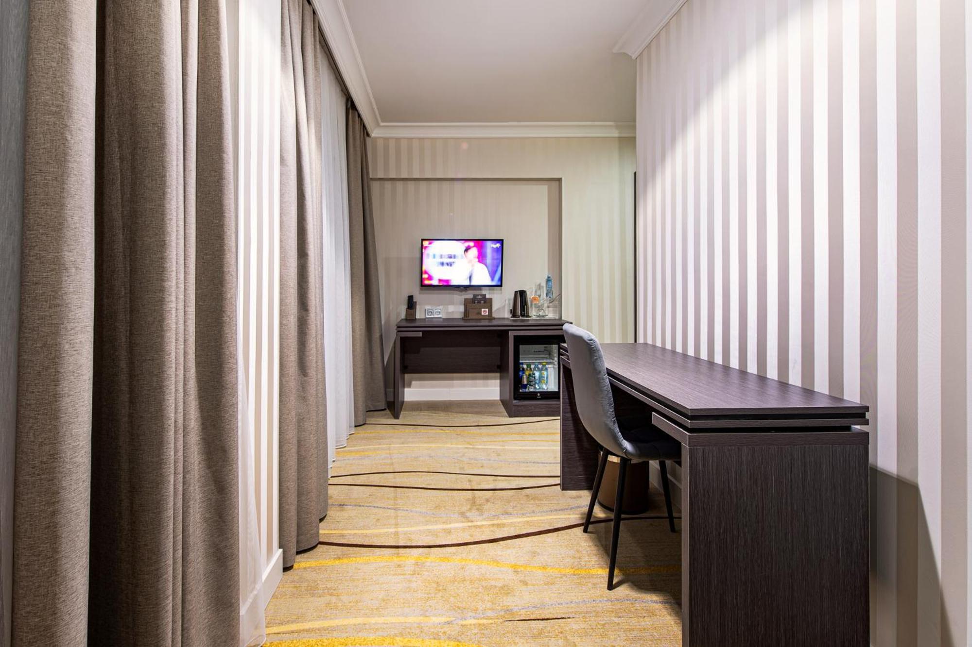 Shymkent Grand Hotel Exterior photo