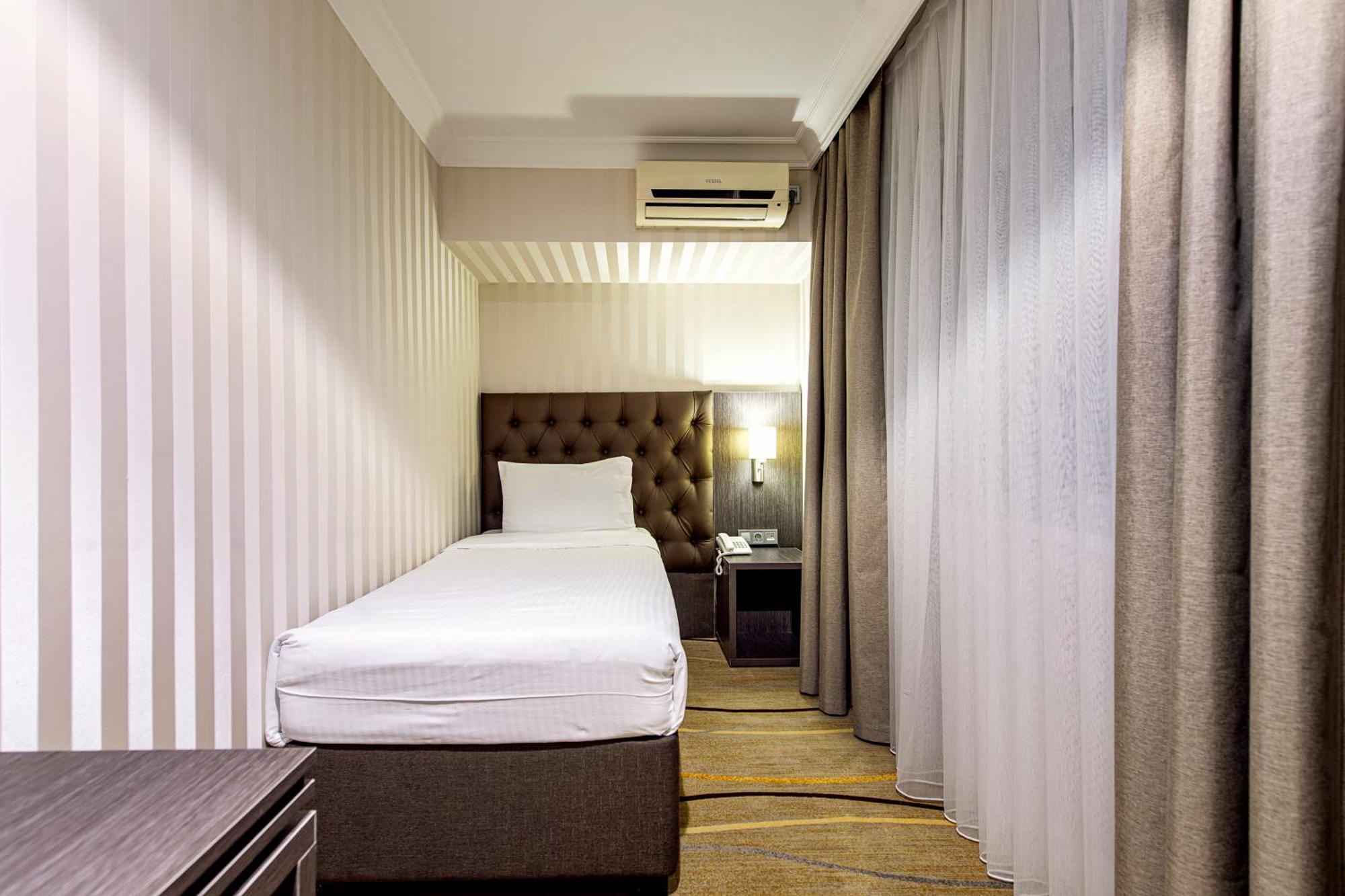 Shymkent Grand Hotel Exterior photo