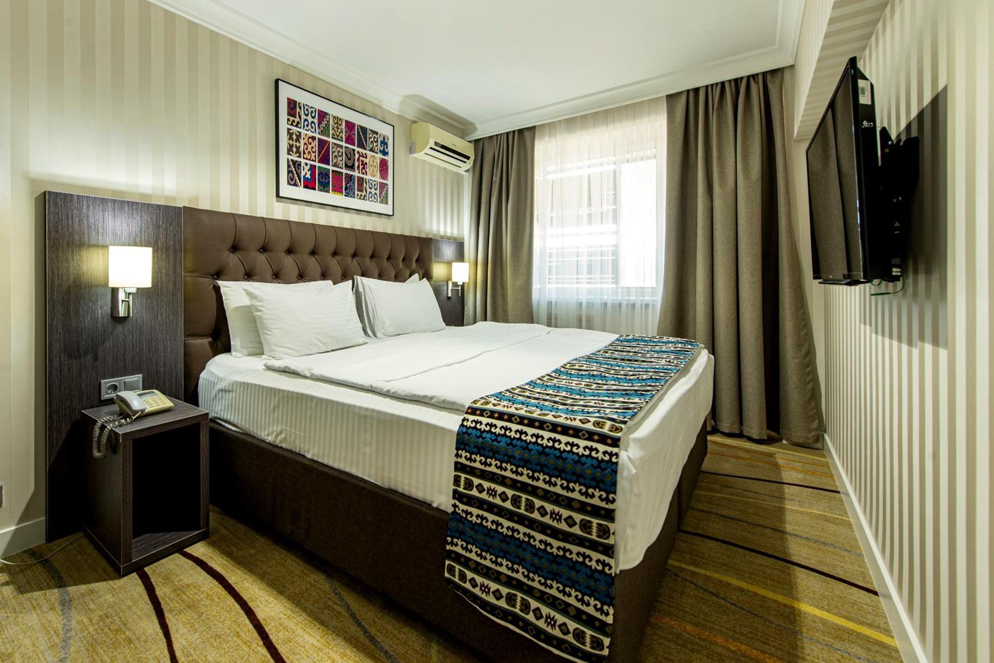 Shymkent Grand Hotel Exterior photo