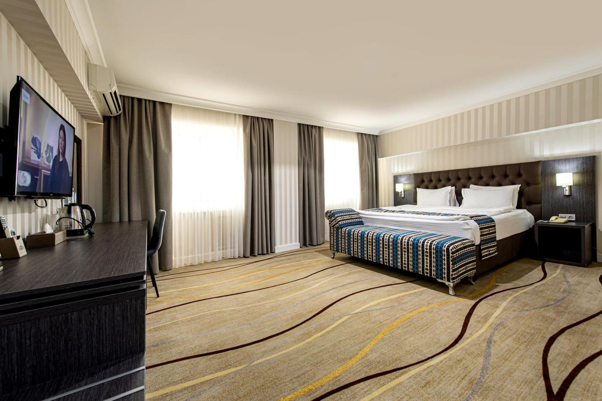 Shymkent Grand Hotel Exterior photo